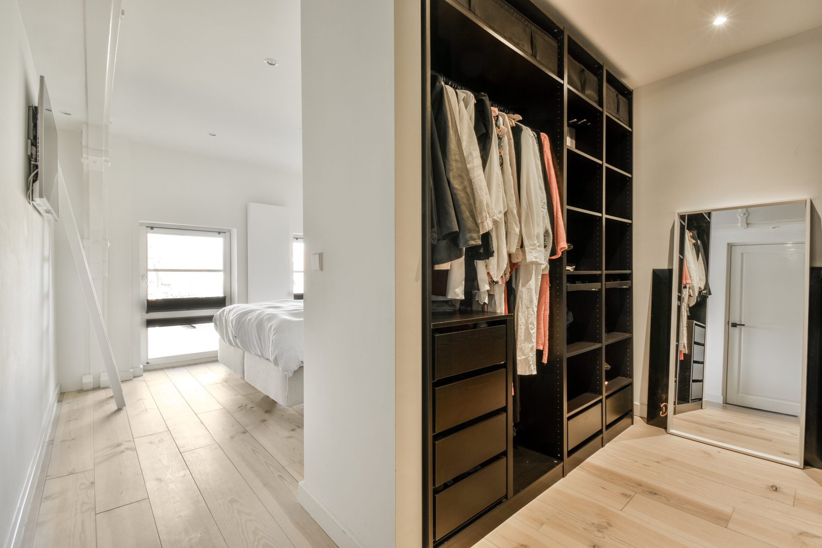 Wardrobe in light room at home